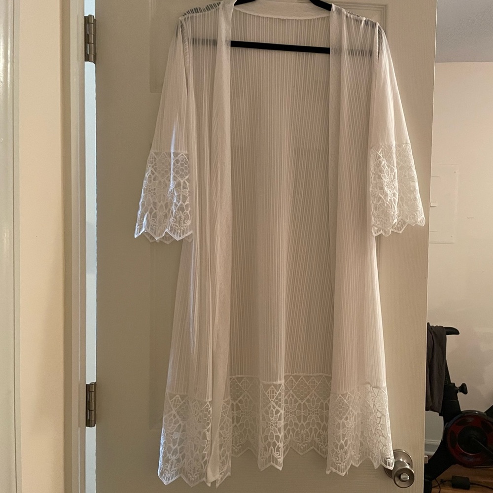 White robe with lace detail